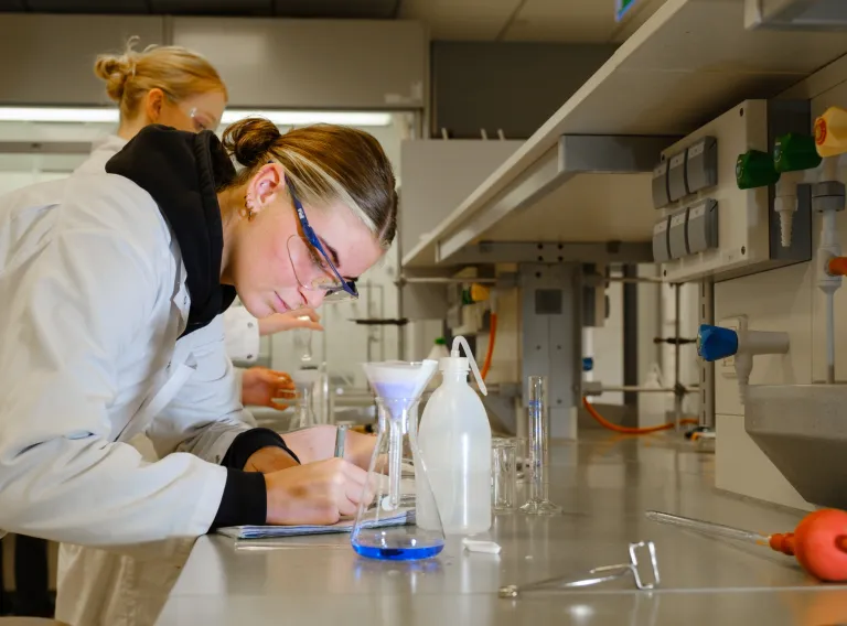 Chemistry students in a lab. 