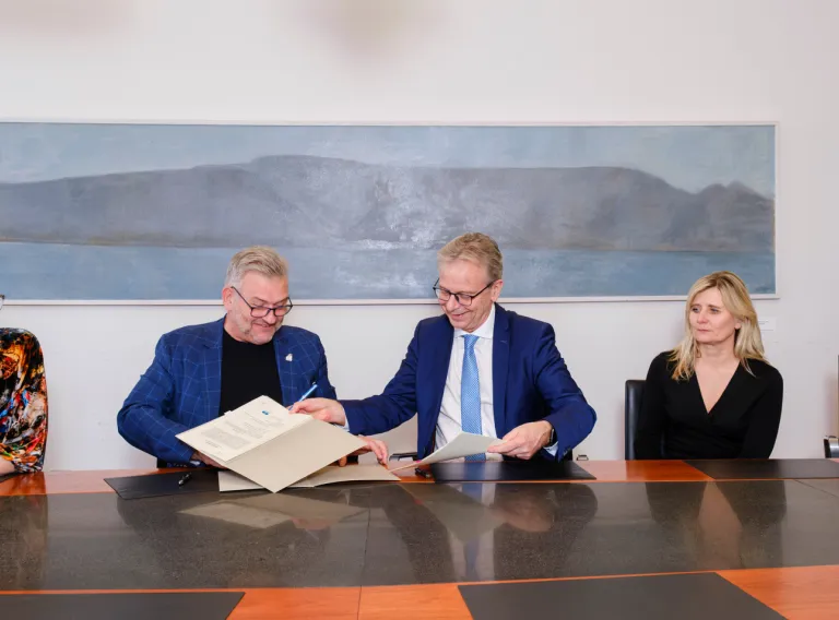 Rector and other staff signing agreement about GEST - Gender Equality Studies and Training Programme