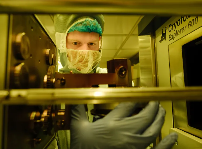 Student conducting industrial engineering research in a lab. 