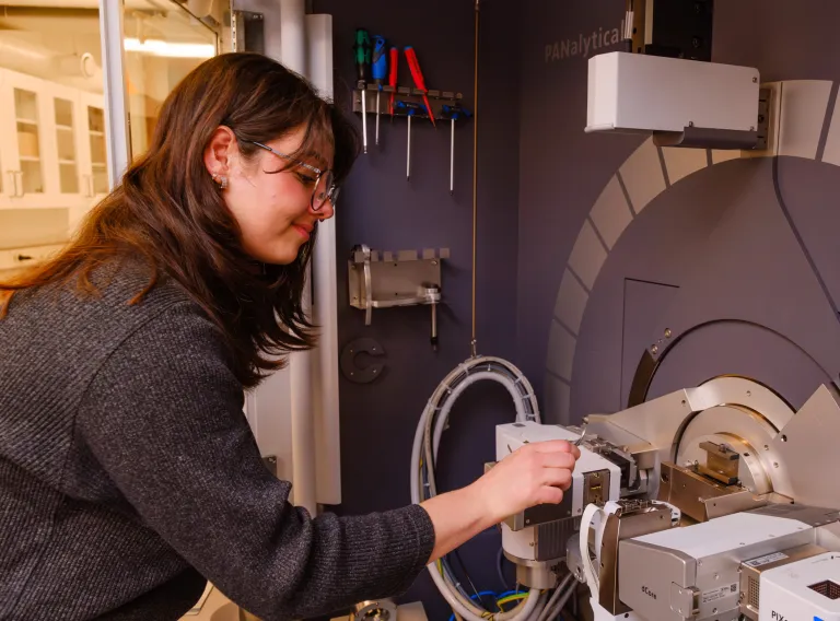 Physics student in a lab. 