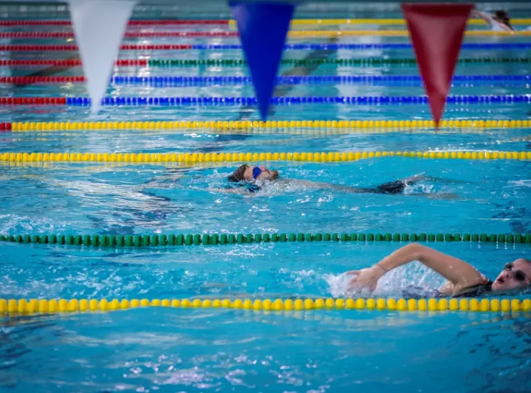 People swimming in swimming pool