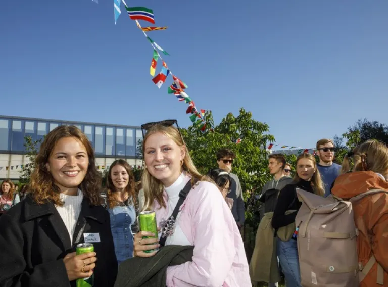 Exchange students in front of main building