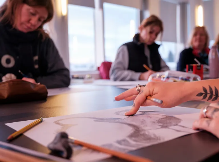 Students drawing in class