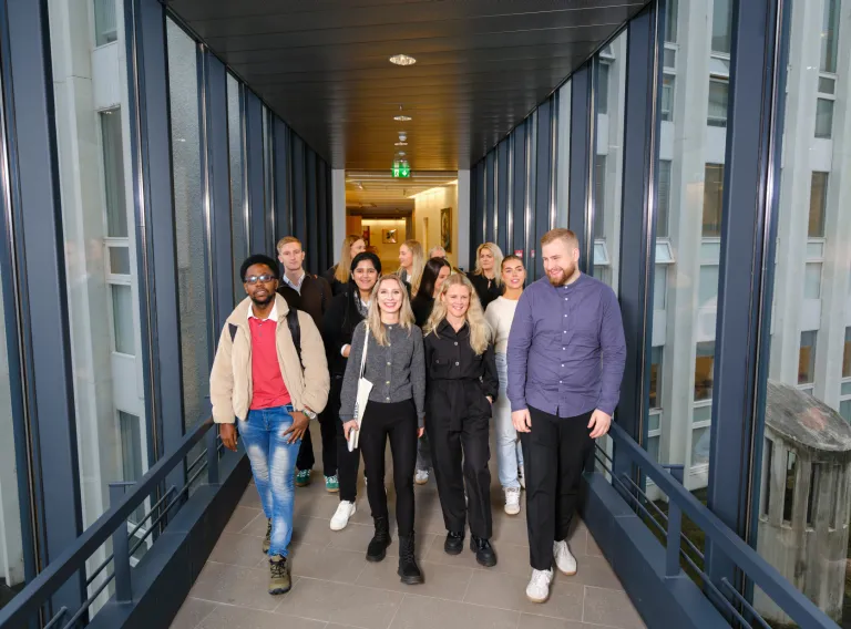 group of people walking towards the photographer