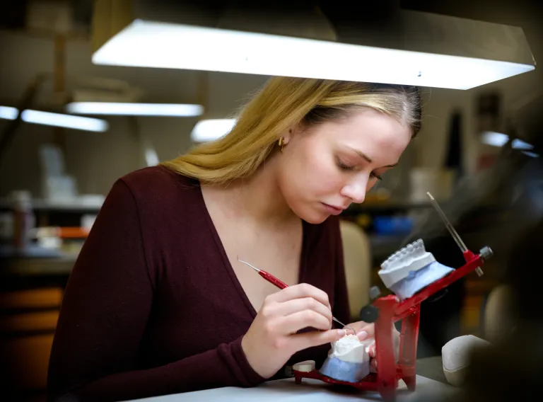 Student doing dental work