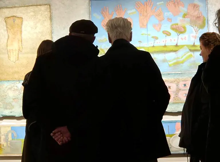 Stories, a joint exhibition of works by artists, held at the Gerðuberg Cultural Centre. Harvest: A cultural festival on disability studies, organised by disabled people’s organisations and disabled artists. The work is by Arnþór Hreinsson. The photo was taken during an audio description tour of the exhibition on 26 February 2025. Photographer: Hanna Björg Sigurjónsdóttir.