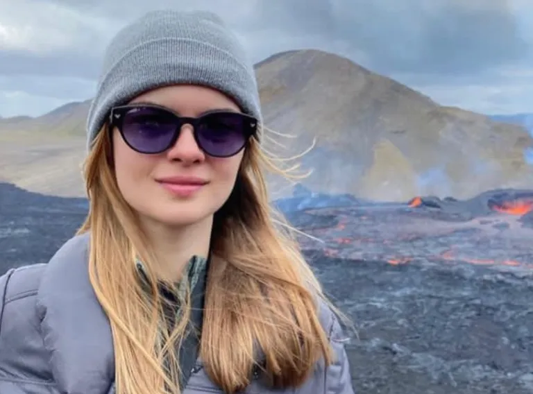 Elif Yaman, volcanic eruption in background