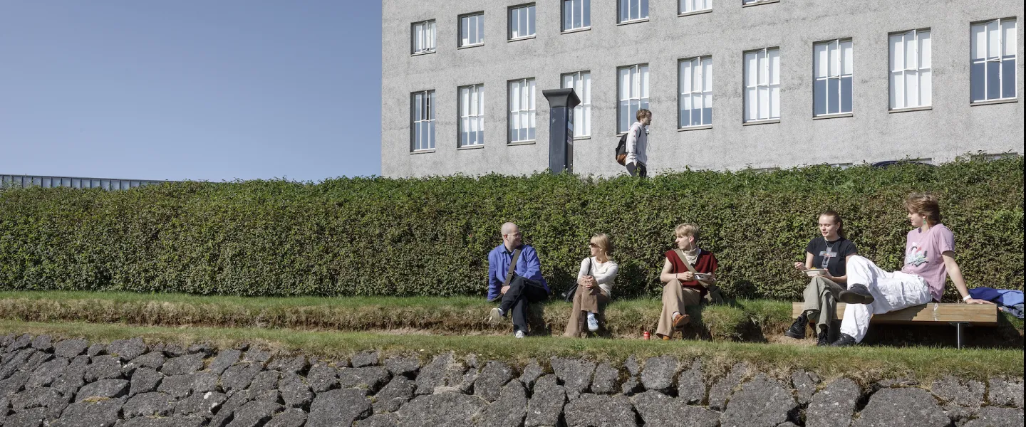People outside of University of Iceland Main building