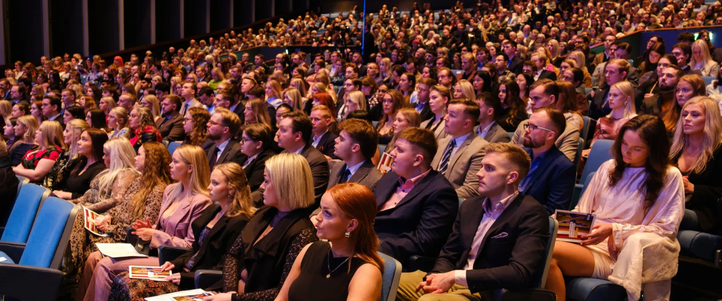 Candidates at a graduation ceremony.