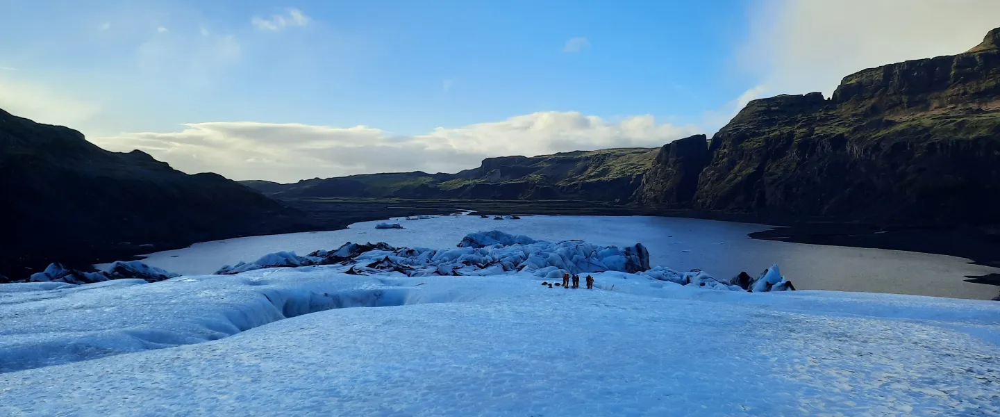 People standing on a glacier.