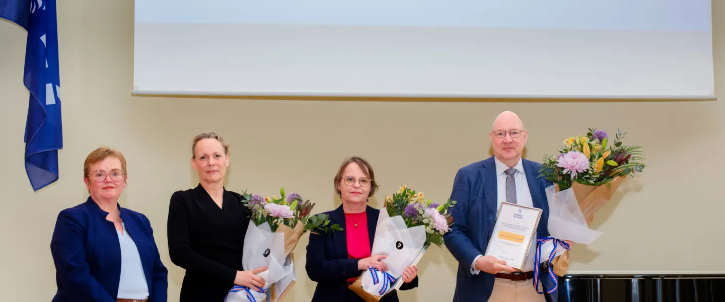 Representatives of the environment and natural resources receive the award.