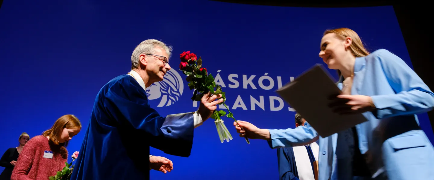 Jón Atli Benediktsson, rector of the University of Iceland, congratulating one of the candidates at a graduation ceremony