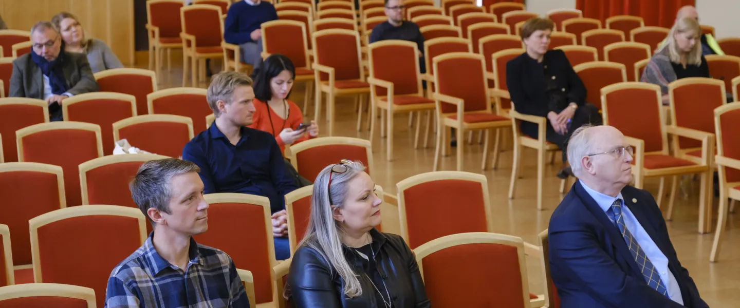 Guests sitting in the Ceremonial hall in University of Iceland Main building