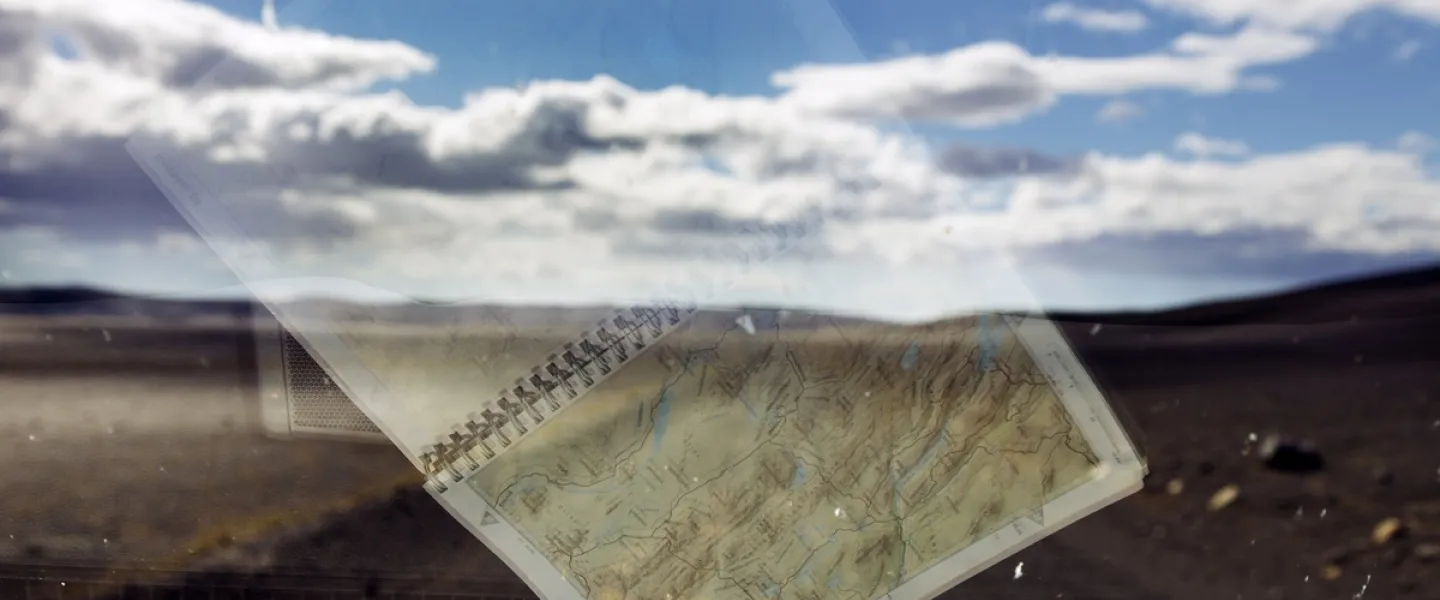 Reflection of a map in a car window