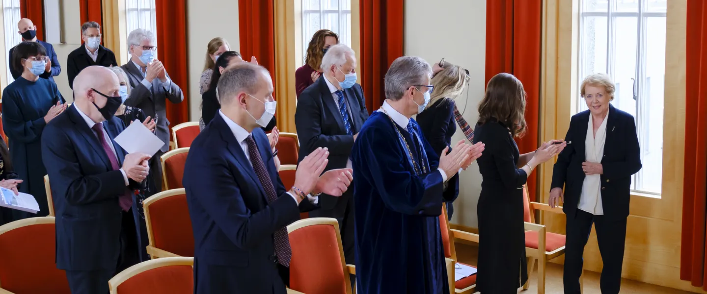 Vigdís Finnbogadóttir and other people in University of Iceland ceremonial hall in Main building