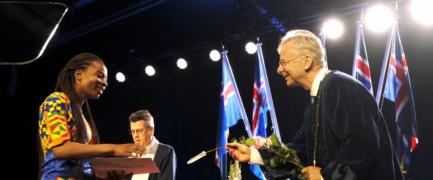 Jón Atli Benediktsson, rector of University of Iceland congratulating one of the candidates at a graduation ceremony