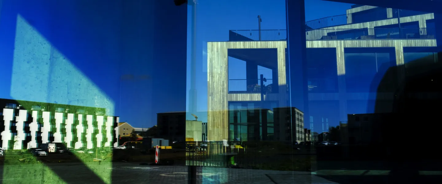 Gróska, reflection in a window