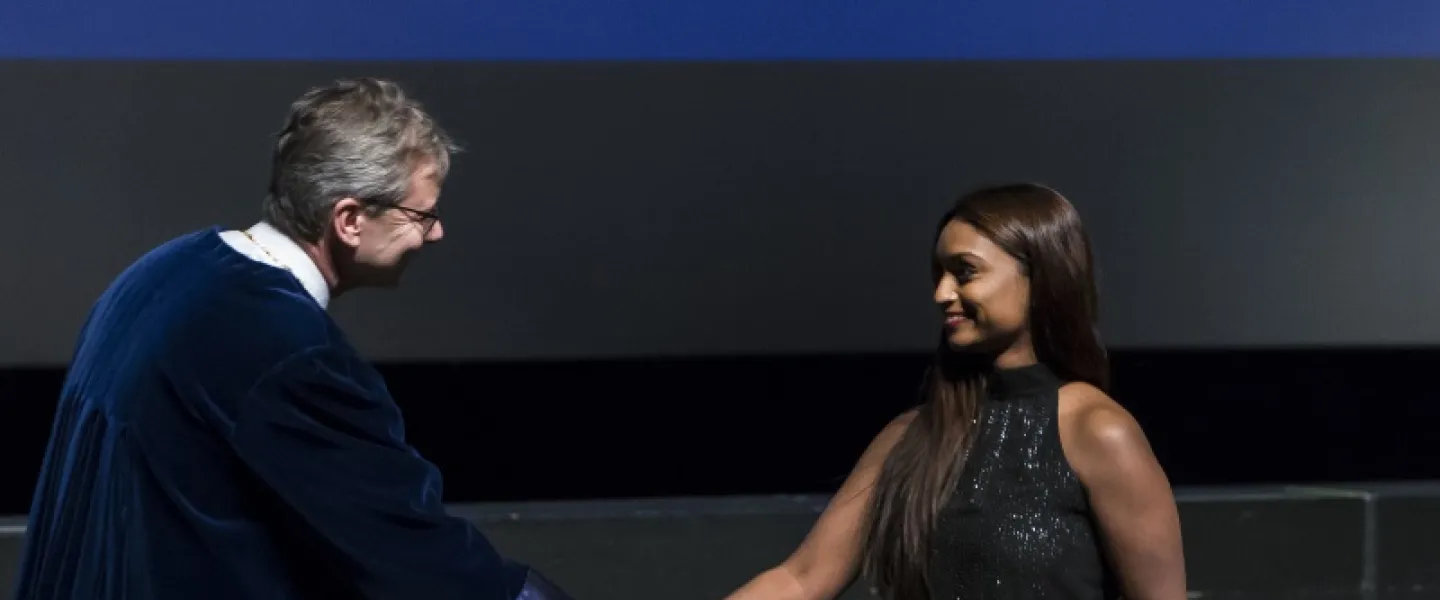 Graduation ceremony at University of Iceland. Jón Atli Benediktsson rector congratulating one of the candidates
