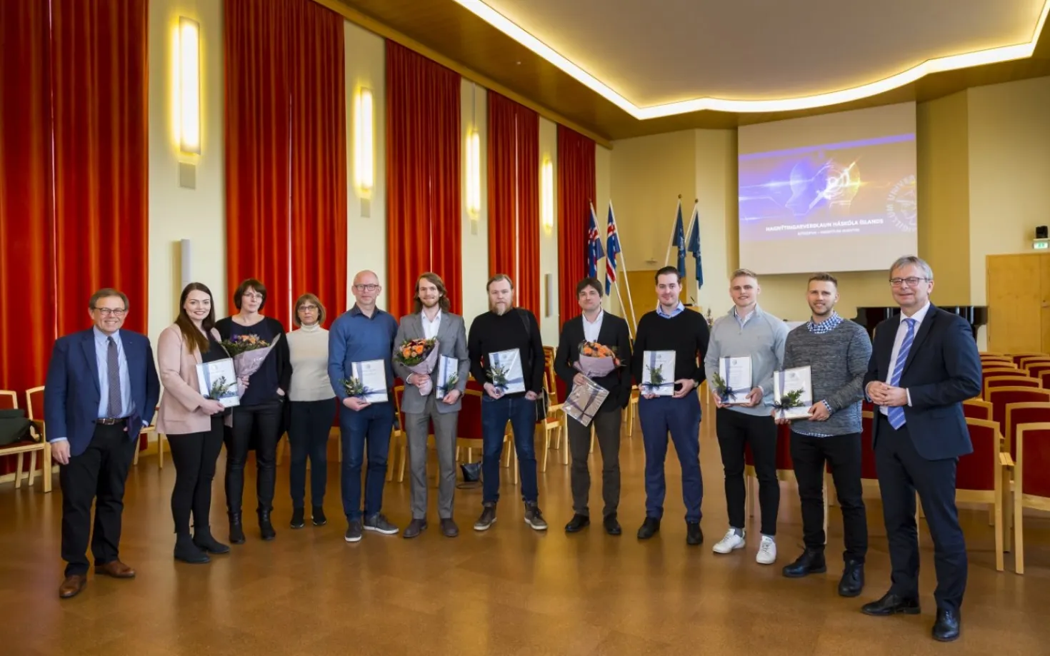 The innovators who received awards for their projects with the University rector and chair of the evaluation committee