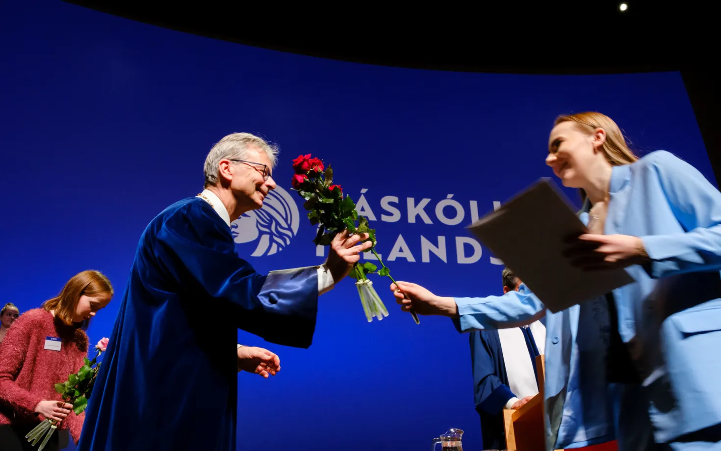 Jón Atli Benediktsson, rector of the University of Iceland, congratulating one of the candidates at a graduation ceremony