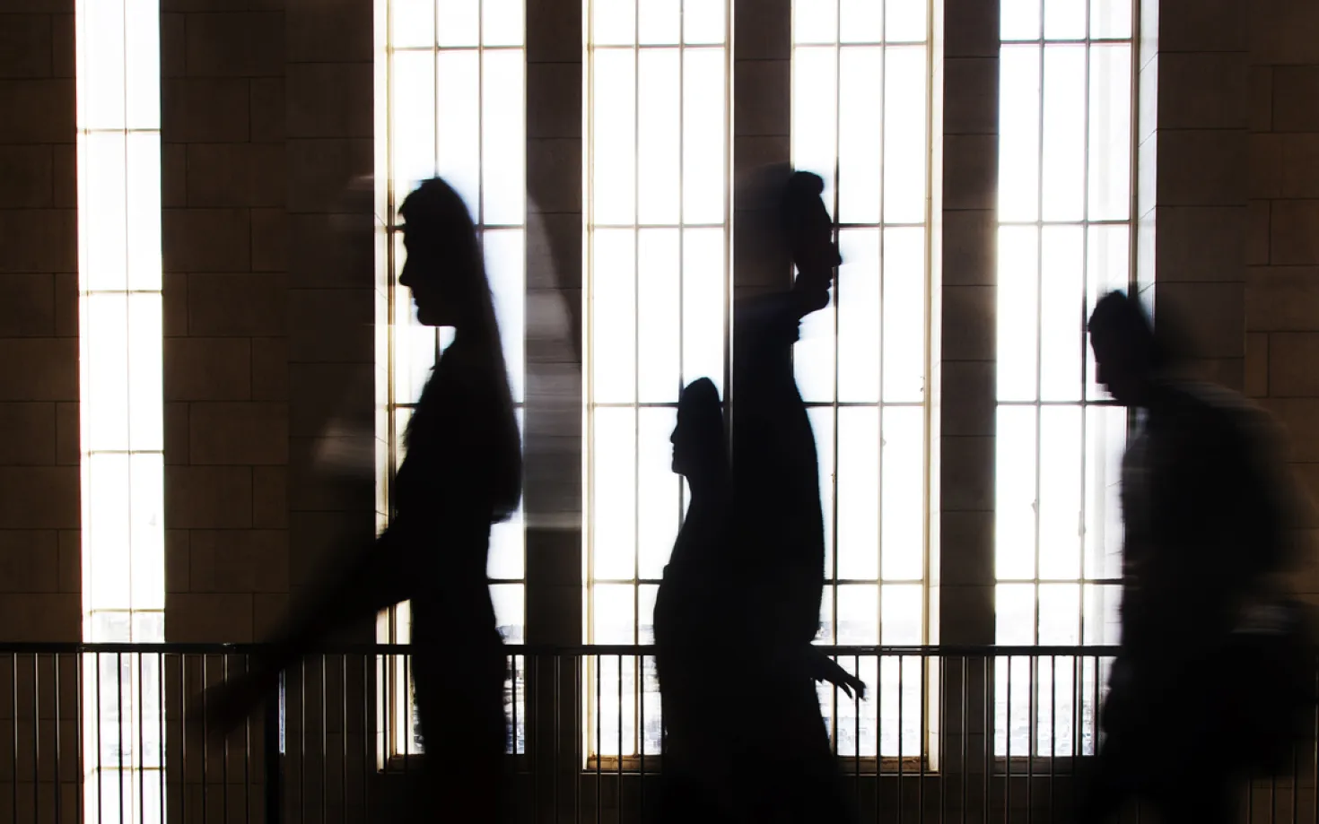 Silhouettes of people inside Main building
