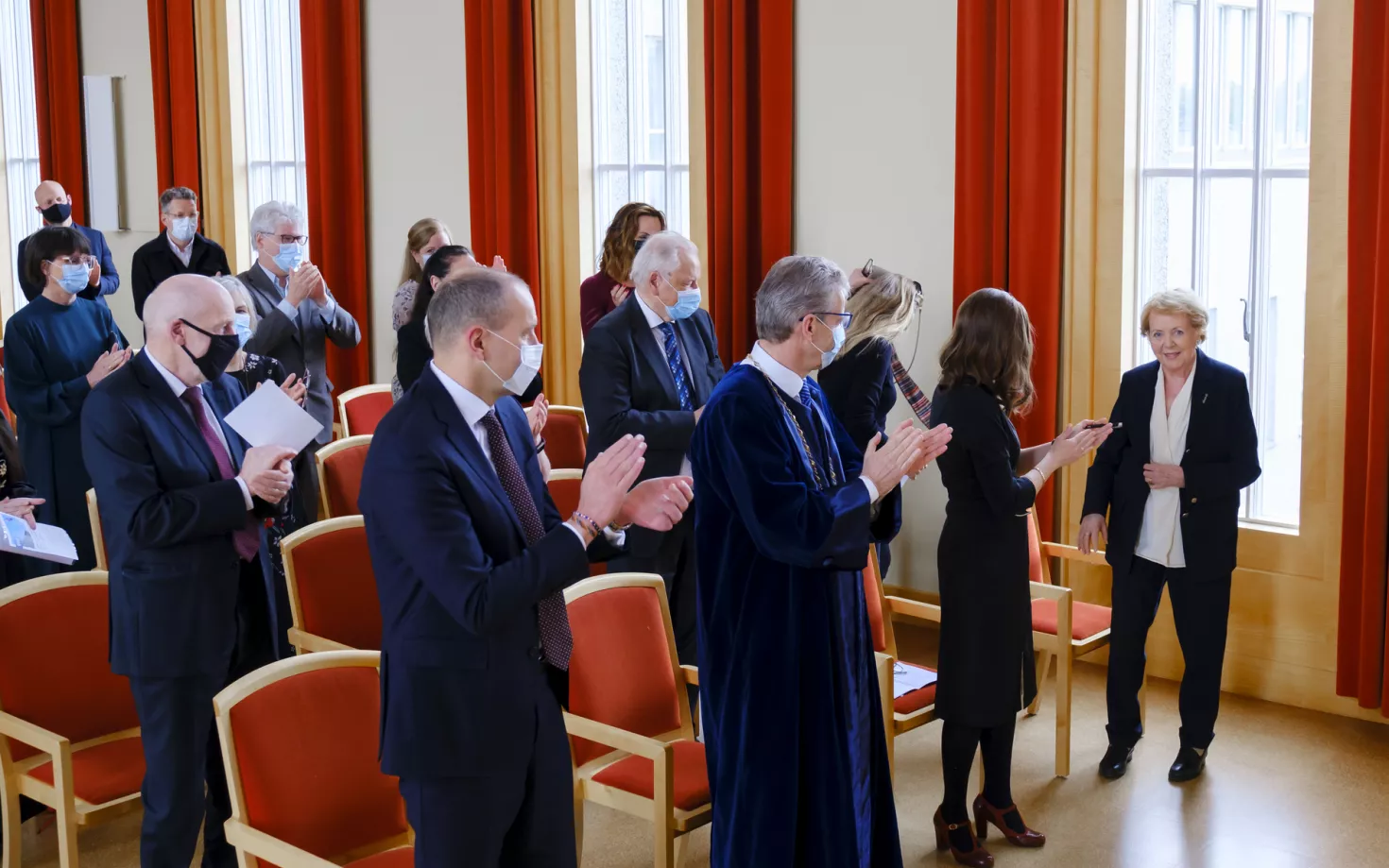 Vigdís Finnbogadóttir and other people in University of Iceland ceremonial hall in Main building
