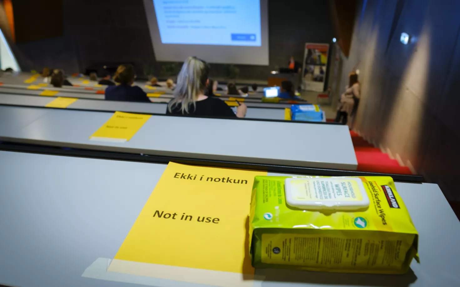 Table not in use because of covid-19 restrictions. Surface wipes on the table
