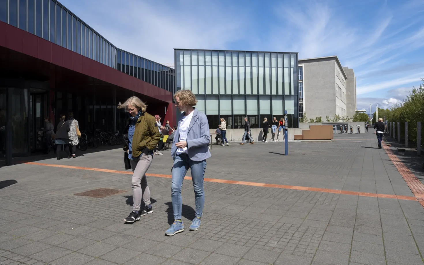 People outside of University centre in the sun