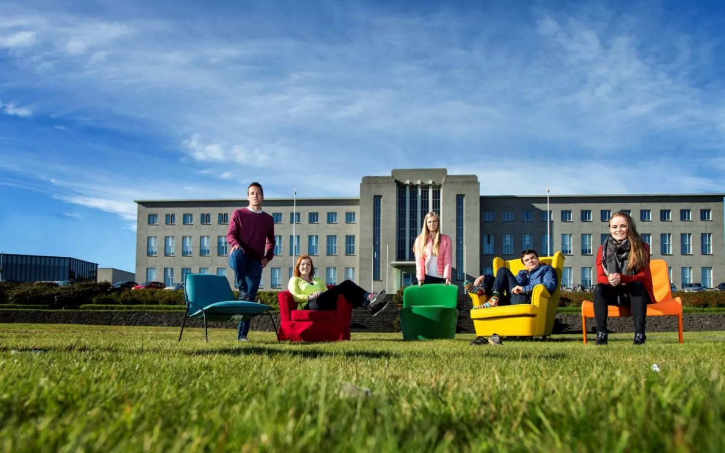 Students in chairs outside of University of Iceland main building