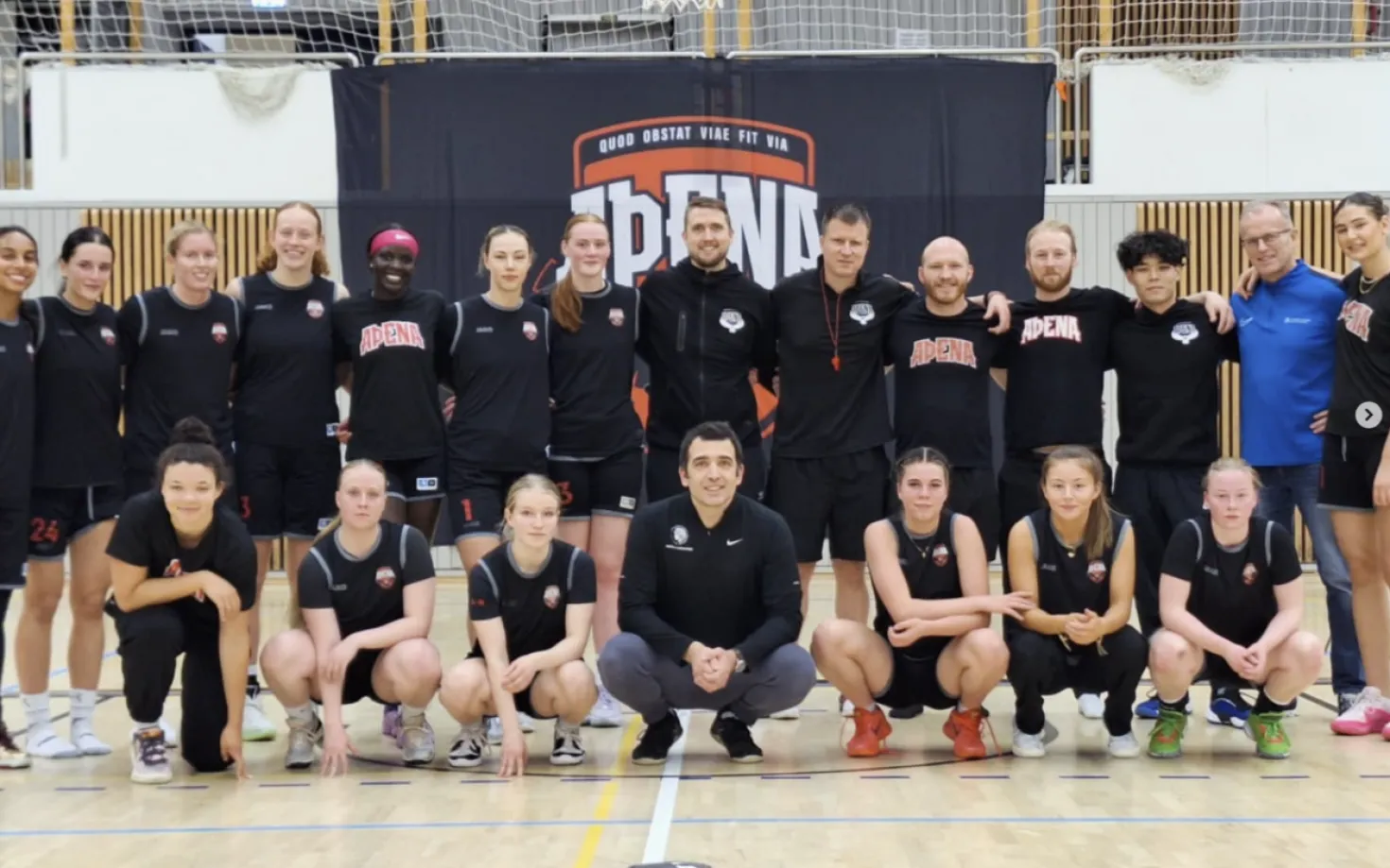 Milos Petrovic with his colleague Þráinn Hafsteinsson and members of the basketball team Aþena who have benefitted well from the centre's services and facilities.