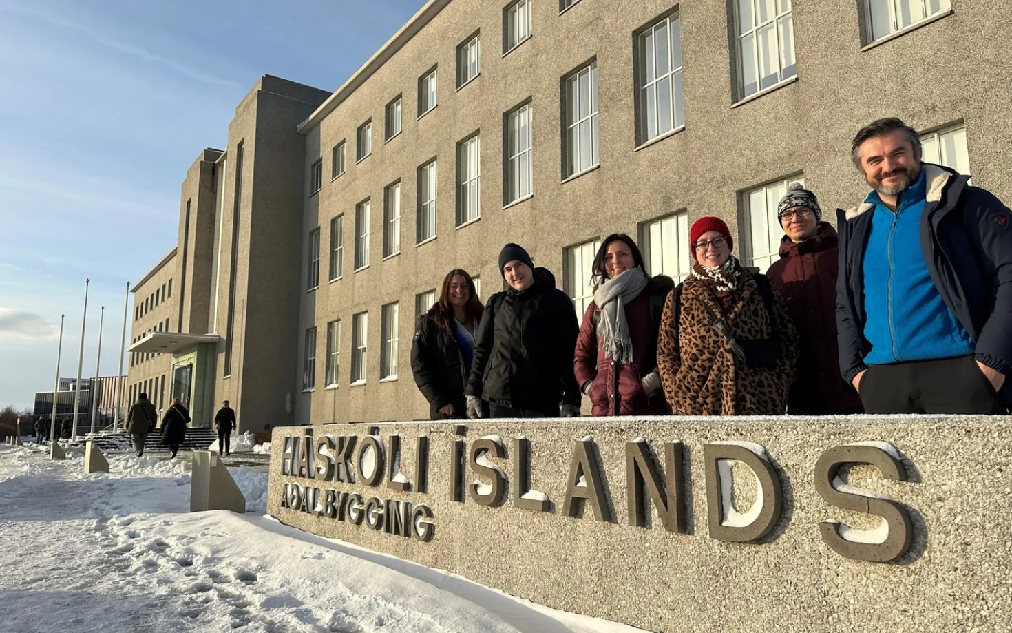 Photo taken in front of the University of Iceland's Main Building in February 2023. On the photo from the left: Sigurbjörg Jóhannesdóttir, University of Iceland; Simonas Šabanovas and Karolina Levanaitė, Vilnius University, Lithuania; Nina Vombergar, University of Ljubljana, Slovania; Tautvydas Bokmota, UAB Theoria, Lithuania and Thomas Dezelan, University of Ljubljana, Slovania. Photographer: Tryggvi Már Gunnarsson