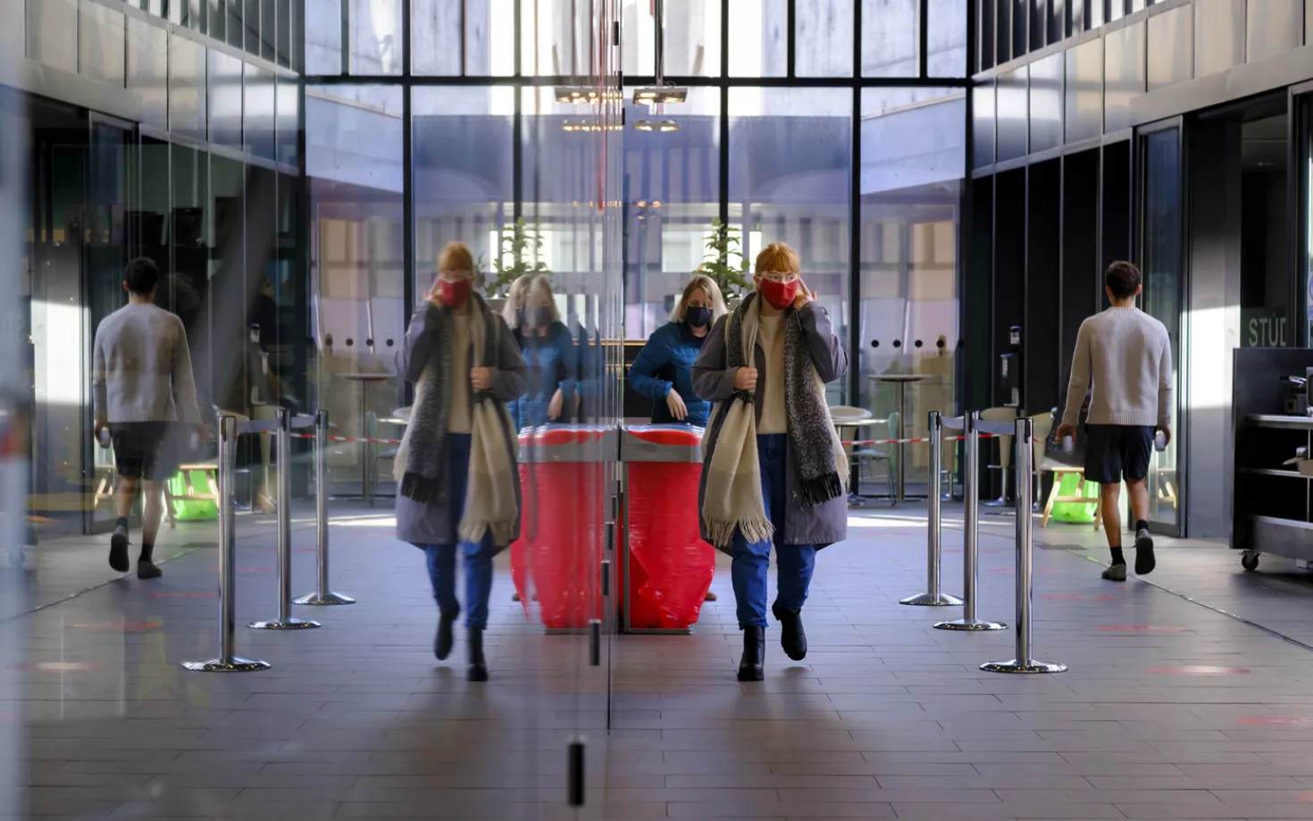 People in University centre during covid-19 pandemic, with face masks