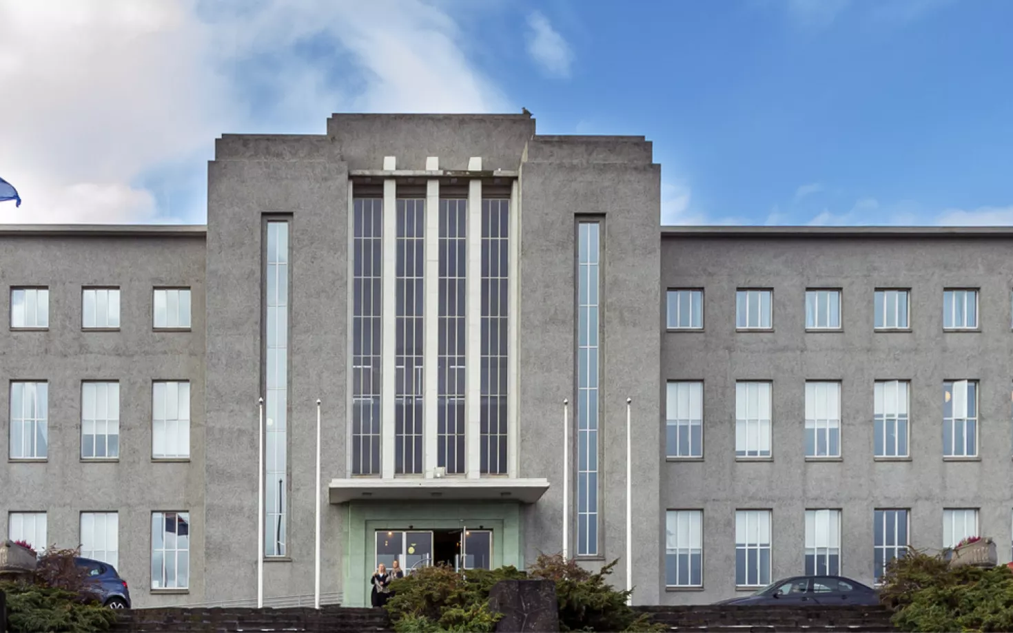 Icelandic flags outside of University of Iceland main building