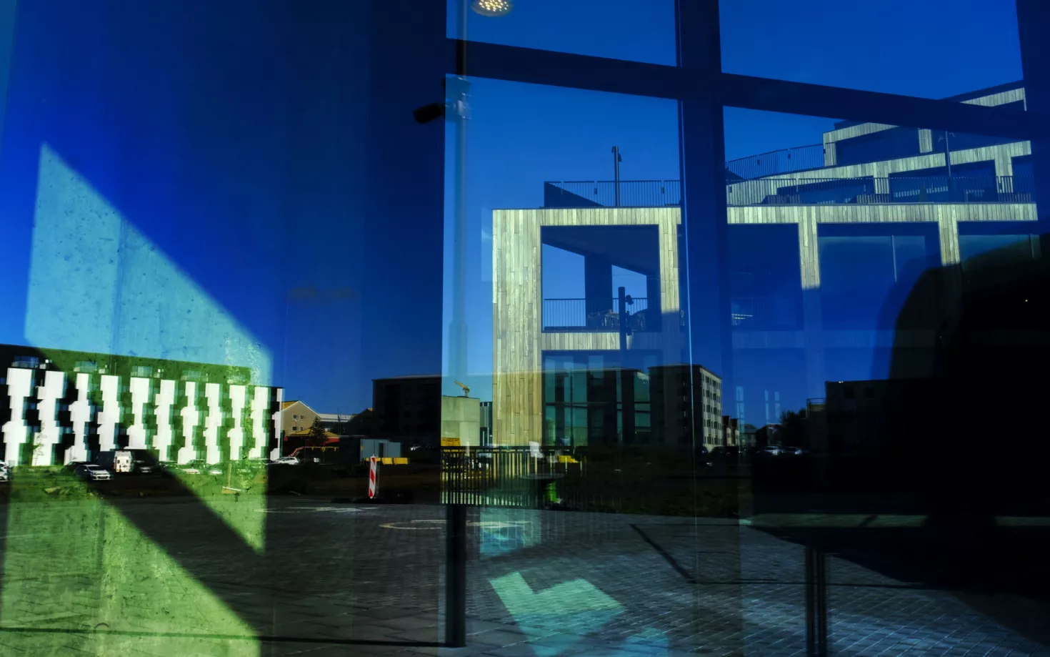 Gróska, reflection in a window