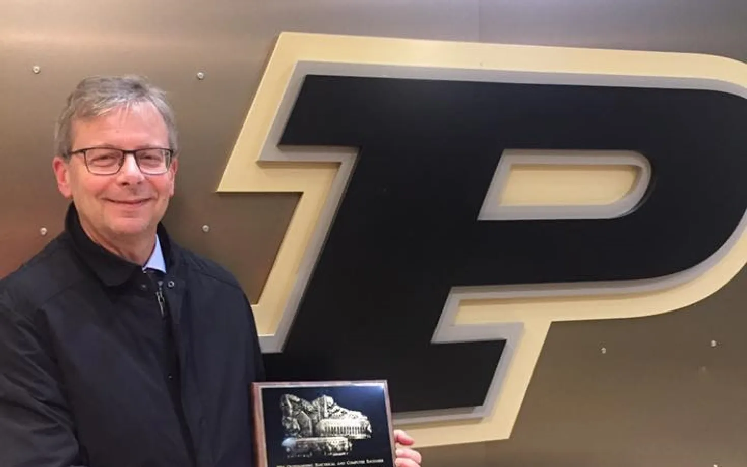 Jón Atli Benediktsson, Rector, with the 2016 Electrical & Computer Engineering Awards from the Purdue School of Electrical & Computer Engineering