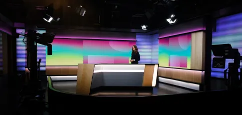 Student in a news set. 