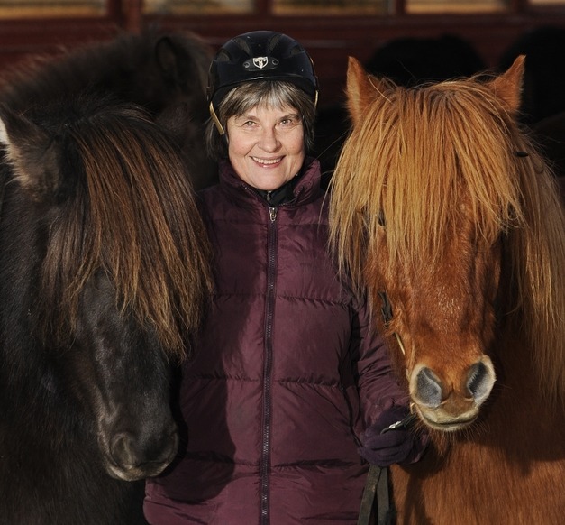 Hrefna Sigurjónsdóttir with two horses