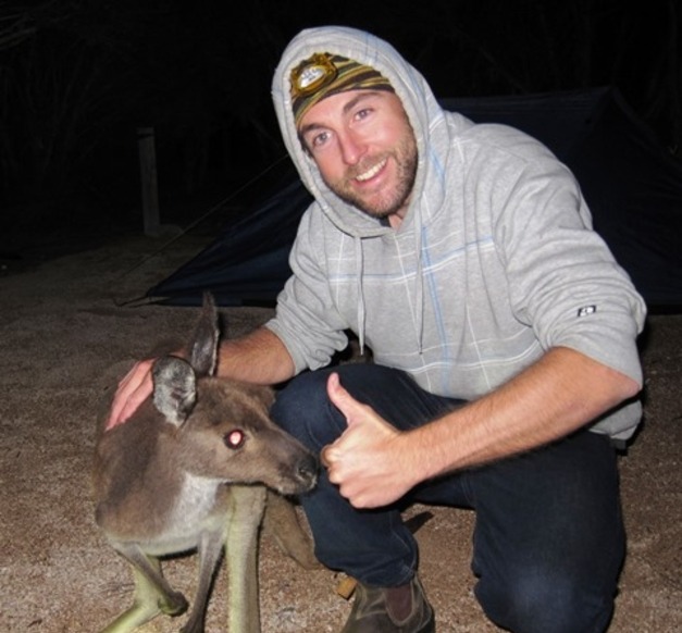 Jed Ian Macdonald with kangaroo