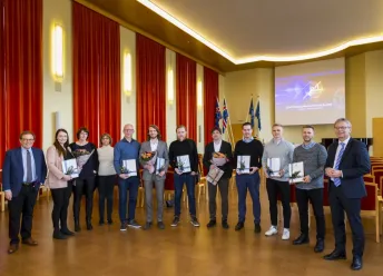 The innovators who received awards for their projects with the University rector and chair of the evaluation committee