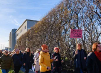 Women going on strike 2023 walking from the University to join other women