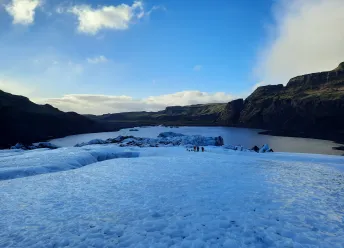 People standing on a glacier.