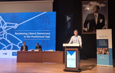 MAximilian Conrad, professor in the Faculty of Political Science, delivering a speech at the conference.
