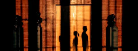 Shadows of people outside the ceremonial hall in University of Iceland main building