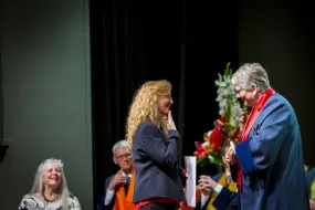Eyrún Ólafsdóttir receiving her diploma from Jónína Vala Krististinsdóttir, Dean of the Faculty of Education and Pedagogy at the Graduation Ceremony 22 June 2019.