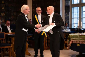 Gavin Lucas receives the Gad Rausing Prize presented to him by Carl XVI Gustaf, King of Sweden.