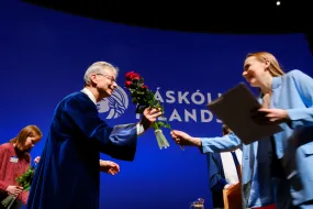 Jón Atli Benediktsson, rector of the University of Iceland, congratulating one of the candidates at a graduation ceremony