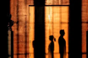 Shadows of people outside the ceremonial hall in University of Iceland main building