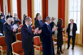 Vigdís Finnbogadóttir and other people in University of Iceland ceremonial hall in Main building