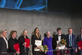 Grantees with Margareth II Queen of Denmark, representatives from the national museums in Iceland and Denmark, and the Vigdís Finnbogadóttir Institute of Foreign Languages, rector of the University of Iceland and the chair of the Carlsberg Foundation