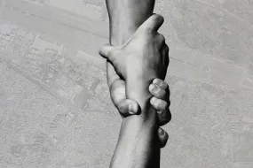 Hands holding together - Höfði Reykjavík Peace Centre’s annual conference